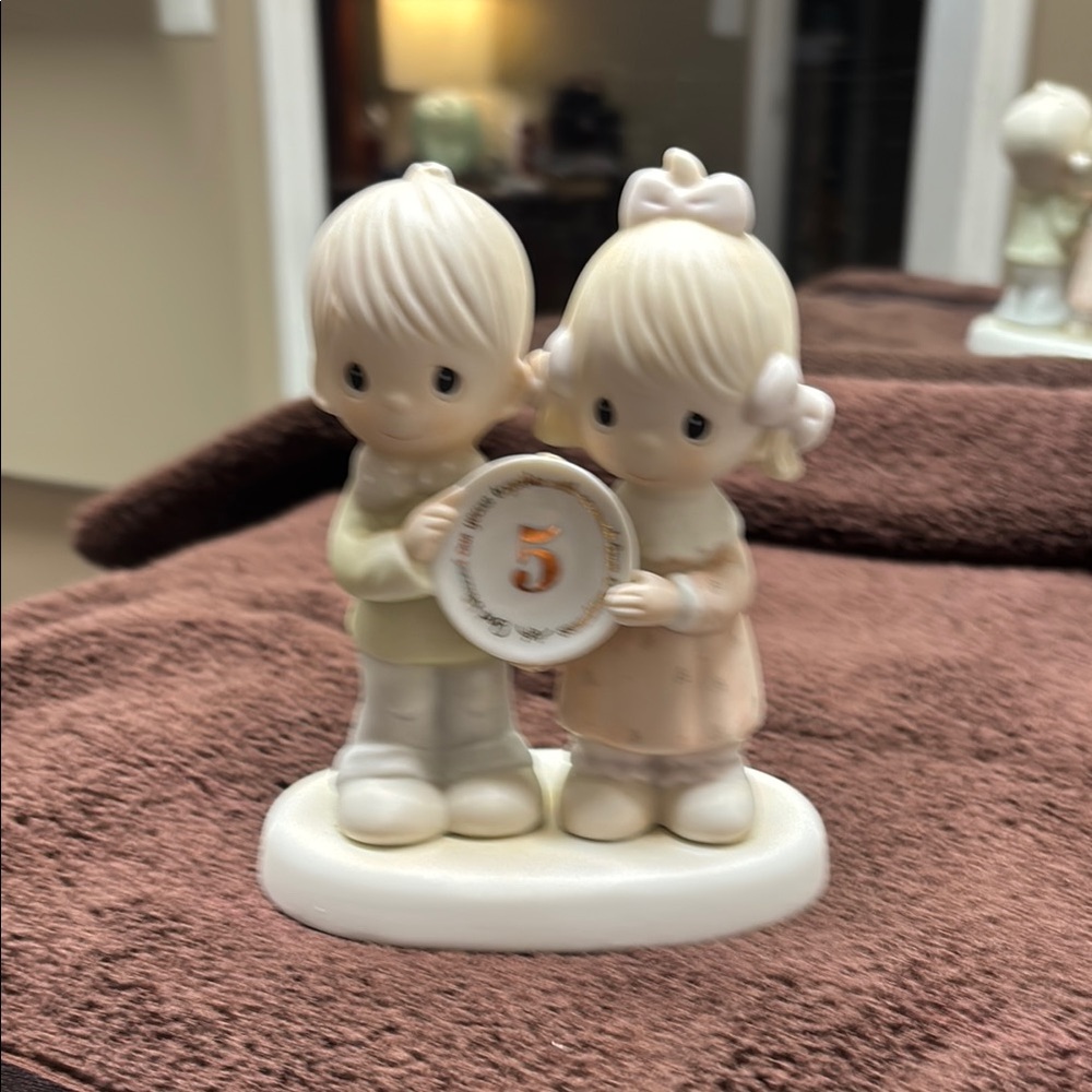 Precious Moments Figurine with Pink and Cream Accents